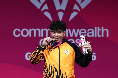 Target conquered! Mohamad Syahmi’s record-breaking triumph sends Malaysia past five-gold Glasgow 2026 goal Mohamad Syahmi Nor Ghazali powered Malaysia beyond their five-gold target with a dramatic victory in the men’s 94kg weightlifting event. — Bernama pic