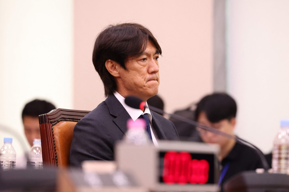 Sau 1 tháng ẩn thân, HLV Hàn Quốc điều trần trước Quốc hội về thất bại ở World Cup 3 Former South Korean men’s national team head coach Hong Myung-bo attends the hearing on the Korea Football Association (KFA) over a controversy surrounding its management at the National Assembly in Seoul July 30, 2026. — AFP pic
