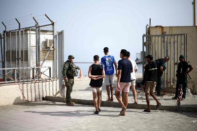 In Spain’s Ceuta, exhausted migrants end short stay with little hope, return across border Migrants approach the Ceuta-Morocco border gate in the Spanish North African enclave of Ceuta August 1, 2026. — AFP pic