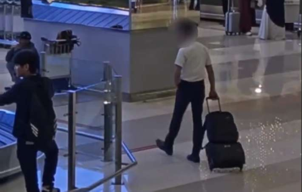 Indonesian authorities put out airport video of Malaysian pilot allegedly smuggling 25kg ecstasy A screen grab shows a Malaysian pilot accused of smuggling 25 kilogrammes of ecstasy at Jakarta’s Soekarno-Hatta International Airport.