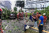 Three freed after fallen tree traps them inside car in George Town Three people were rescued after a tree fell on their Perodua Ativa along Jalan Macalister in George Town this morning. — Picture via Facebook/Pusat Gerakan Operasi JBPM Pulau Pinang