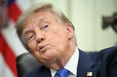 A year after Trump welcomed Putin to Alaska, hopes for Ukraine peace have given way to a widening war US President Donald Trump looks on before signing an executive order calling for more research and flexibility on vaccines, in the Oval Office of the White House in Washington, DC, on August 10, 2026. — AFP pic