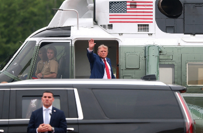 Trump reportedly smuggled off Air Force One in catering truck amid Iran missile threat US President Donald Trump waves while boarding Marine One after he attended the 2026 Patriot Games at SPIRE Academy on August 11, 2026 in Geneva, Ohio. — AFP pic