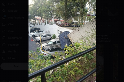 Rubbish lorry crashes through Pantai Hillpark condo wall, crushes three cars Kuala Lumpur Traffic Investigation and Enforcement Department (JSPT) chief ACP Mohd Zamzuri Mohd Isa said the lorry was travelling downhill along a straight, sloping road when the incident occurred at about 4.10am. — Picture from social media