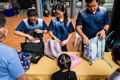 Thailand schools ramp up bag checks after deadly shooting sparks safety fears Staff inspect students’ backpacks as part of new security measures at Sawasdee Wittaya School in Bangkok on August 14, 2026. — AFP pic
