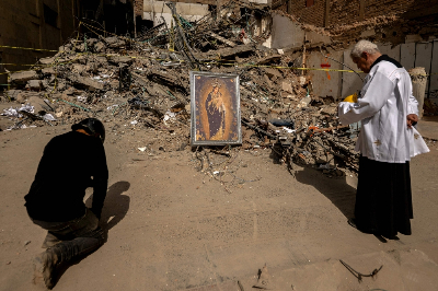 Photos, memories all that remain for Colombia's bereaved after quake Priest Nelson Giraldo Mejia and a parishioner pray during a procession with the Virgen de la Pobreza, patroness of Pereira, in front of the rubble of a building after the earthquake, in Pereira on August 14, 2026. The chances of finding earthquake survivors in Colombia dropped significantly on August 14, four days after the 7.4-magnitude tremor struck, though rescue efforts plowed ahead as hundreds remained missing. — AFP pic