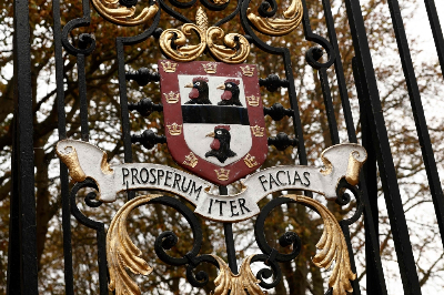 Cambridge head slams 'feeding frenzy' over dead academic A crest is pictured on a gate a Jesus College, where black academic Jason Arday was a Fellow, at the University of Cambridge in Cambridge, eastern England on August 15, 2026. Cambridge's top administrator Vice-Chancellor Deborah Prentice said Friday the UK university was