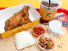Bangkok’s Haroy debuts its Hat Yai fried chicken in Subang Jaya, eaten the Thai way with sticky rice, chili sauce and fried shallots Haroy offers an unconventional pairing of Hat Yai fried chicken, lightly marinated in spices with sticky rice, their Haroy sauce (which has a sweet-spicy profile), and fried shallots. — Picture by Lee Khang Yi