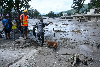 From Malaysia and Singapore to China, Europe and beyond: The 1,300-plus missing in Nepal-Tibet floods A security officer and his sniffer dog search for survivors following flash floods in Trishuli, Nepal’s Nuwakot district, on August 27, 2026, as rescue teams hunt for more than 1,300 people missing after the disaster. — AFP pic