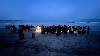 Family outing turns to tragedy as father and eight-year-old son drown off Pengerang Members of the public gather along the shore near a campsite in Kampung Punggai, Pengerang, where a father and his eight-year-old son drowned during a family outing on August 30, 2026. — Social media pic