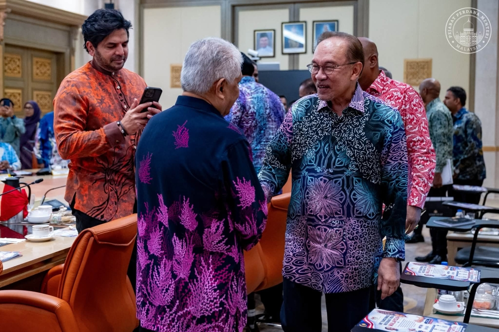 Anwar vows to strengthen MITRA and expand Indian community support Prime Minister Datuk Seri Anwar Ibrahim speaks with attendees during an engagement session. — PMO pic