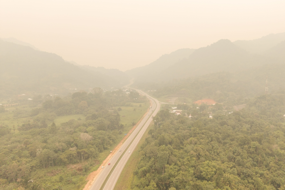 How haze from Indonesian fires impacts Southeast Asia An aerial view shows thick haze over a trunk road in Serian, a town in the Kuching Division of Sarawak, on the island of Borneo, on September 5, 2026. Indonesia has for weeks been fighting wildfires blanketing parts of Borneo and Sumatra with smog, with haze also contributing to air pollution in Malaysia, Singapore, and the Philippines. — AFP pic