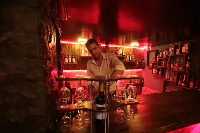 ‘Sobering reality’: Smuggled bottles and empty shelves mark Syria’s alcohol crackdown A bartender prepares alcoholic drinks at a bar in the northeastern Syrian Kurdish city of Qamishli on August 18, 2026. — AFP pic