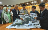Penang govt auctions Tanjung Pinang land as bypass project races towards 2027 finish Penang Chief Minister Chow Kon Yeow (second from right) and state exco Zairil Khir Johari (third from right) look at the alignment for Package One of the Ayer Itam–Tun Dr Lim Chong Eu Expressway bypass project in George Town on February 27, 2025. The state will auction a 2.42-hectare plot in Tanjung Pinang on October 7, 2026 to help fund the project’s remaining works. — Picture by Opalyn Mok