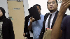 Contractor fined RM20,000 after pleading guilty to using fake documents for RM5m Felda project The accused, Wan Shahrinizam Wan Ibrahim (face partially covered), at the Johor Bahru Sessions Court today. He was earlier charged with submitting false documents to obtain a road resurfacing and drainage system upgrade project at Felda Chiku 3, Gua Musang, Kelantan, about three years ago.— Picture by Ben Tan