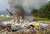 Flying Doctor Service helicopter carrying five crashes near Long Lellang airport Photo circulated on social media of the helicopter wreck. — Picture via Facebook
