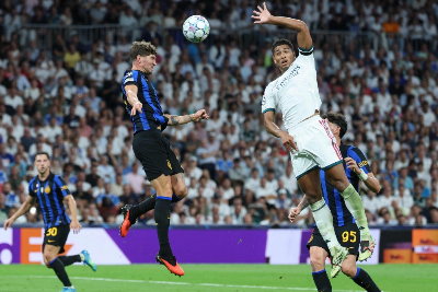 Real Madrid win Champions League opener as Haaland hits brace for Man City Inter Milan’s English defender #06 John Stones (left) heads the ball challenged by Real Madrid’s English midfielder #05 Jude Bellingham during the Uefa Champions League first round day 1 football match between Real Madrid and Inter Milan at the Santiago Bernabeu stadium in Madrid September 8, 2026. — AFP pic