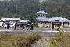 Remains of five Long Lellang helicopter crash victims recovered, DNA identification to follow The bodies being transported at the Long Lellang STOLport. — The Borneo Post pic