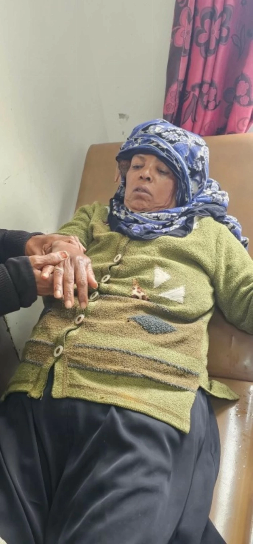 امرأة إحدى ضحايا الانفجار.